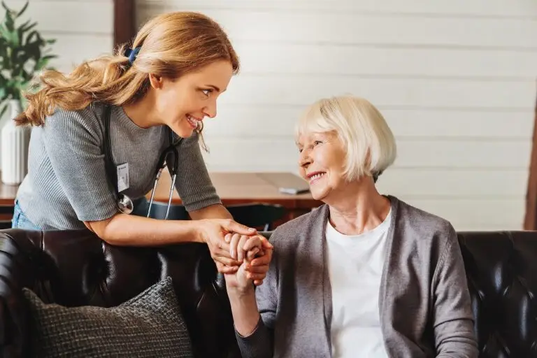 Social worker with elderly woman