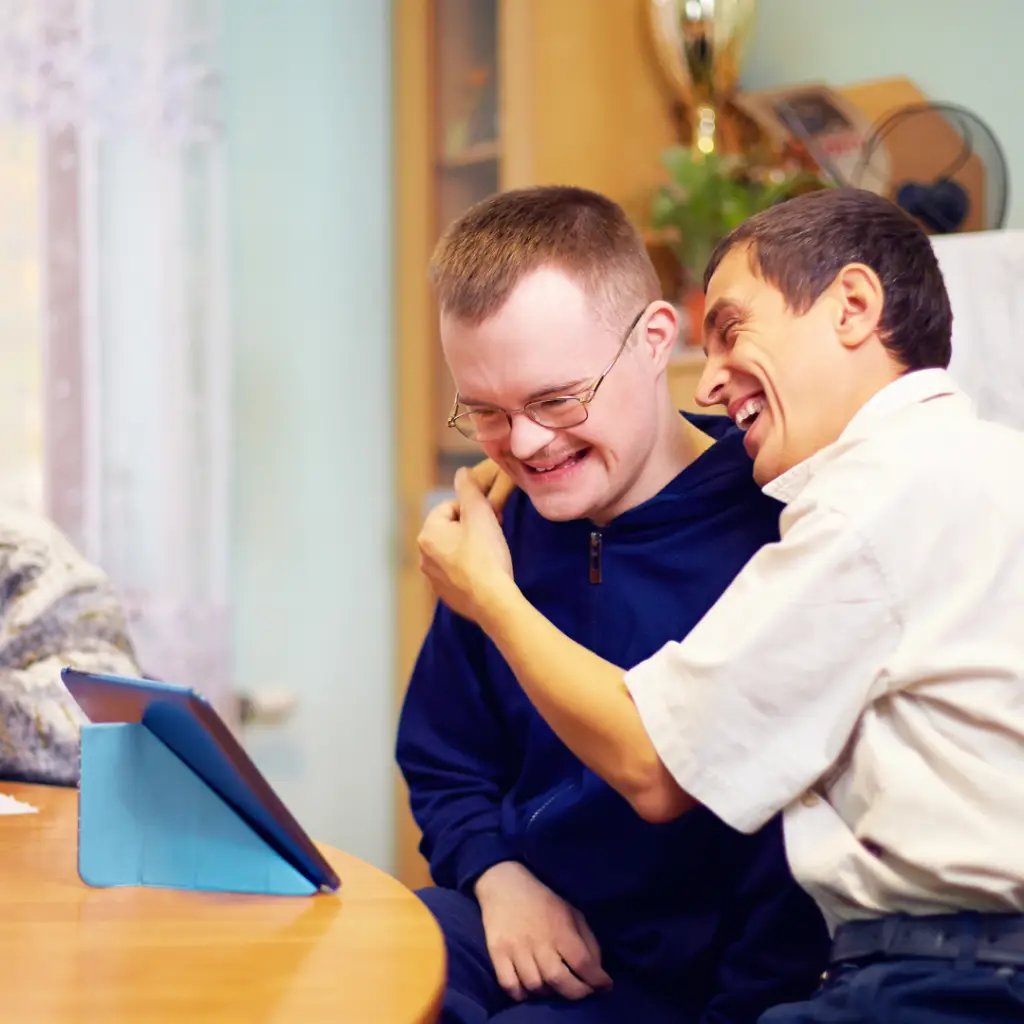 Two people laughing